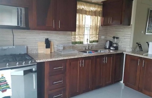 Falmouth House | Spacious two bedroom home with ocean view, pool and tennis court.