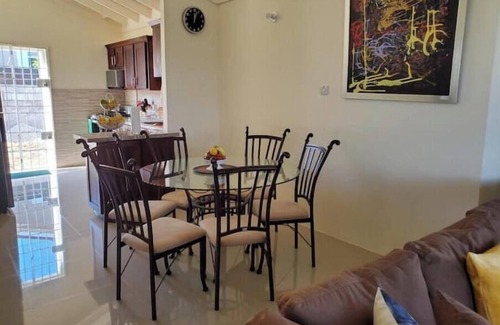 Falmouth House | Spacious two bedroom home with ocean view, pool and tennis court.