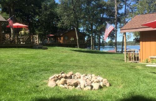 West Branch House | Spacious Lake Cabin Rental with a Private Hot Tub in Ogemaw County, Michigan