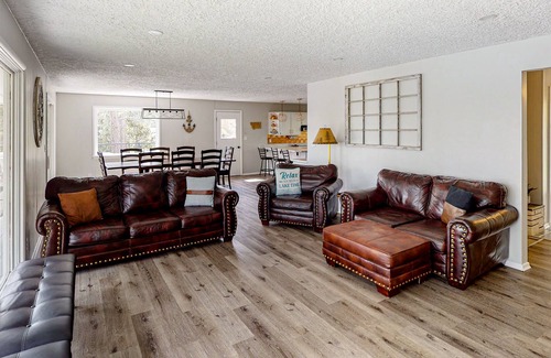 Kalispell House | Spacious lakefront home with private hot tub, kayaks, canoes & dock