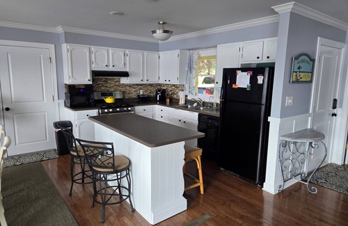 Sister Lakes House | Spacious lakefront home on peaceful Cable Lake.