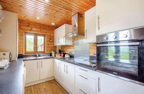 Menai Bridge Ski Chalet | Spacious, light, all wood luxury lodge in tranquil location at head of lake.