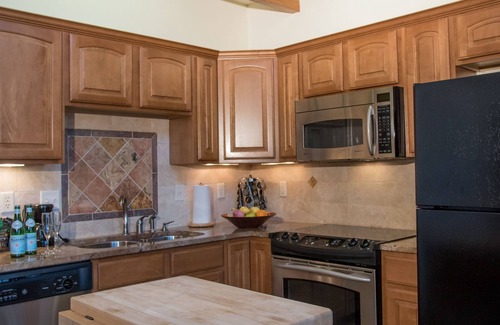 Stanley Hills Condo | Spacious, lofted condo, private patio with hot tub, and views of RMNP!