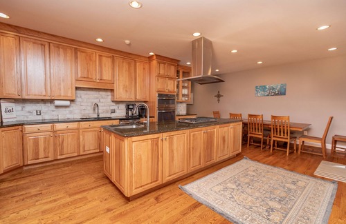 Bracey House | Spacious new home on main lake with stunning views and convenient location