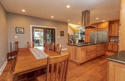 Bracey House | Spacious new home on main lake with stunning views and convenient location