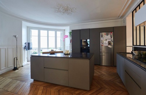 Quartier de Rochechouart Apartment | Spacious Parisian Apartment in Historic building, Private Garden