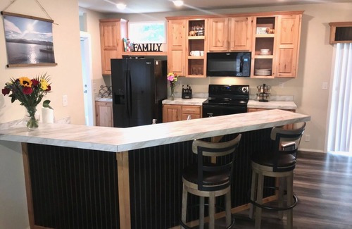 Priest River House | Spacious Priest Lake getaway for a family vacation, group golf or fishing trip.
