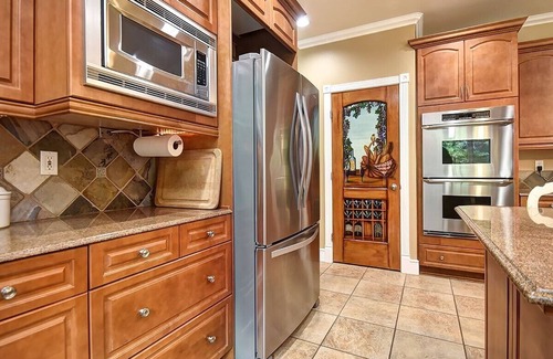 North Creek House | Spacious retreat in quiet neighborhood with fenced dog yard