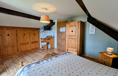 Anould Bed & Breakfast | Spacious room with balcony and heated pool access