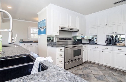 Wrightsville Beach House | Spacious sound front home w dock access!