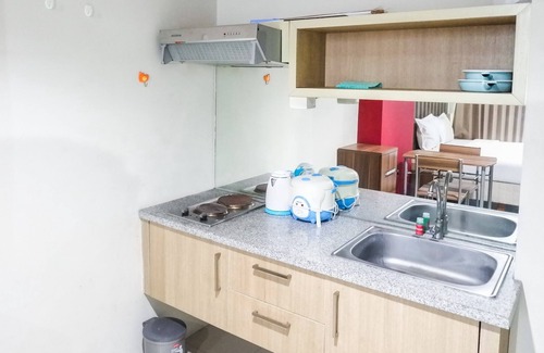 Siwalankerto Apartment | Spacious Studio Room at The Square Apartment