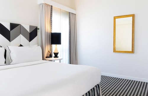 Norma Triangle Hotel | Spacious Suite with Recreational Amenities! Rooftop Heated Pool, Pet-friendly!