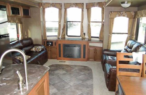 Benzonia RV Rental | Spacious Two Bedroom RV Cabin in Timberline Campground
