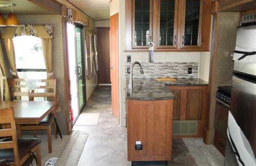 Benzonia RV Rental | Spacious Two Bedroom RV Cabin in Timberline Campground