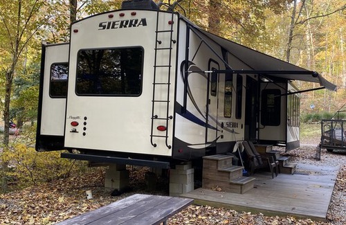 Benzonia RV Rental | Spacious Two Bedroom RV Cabin in Timberline Campground