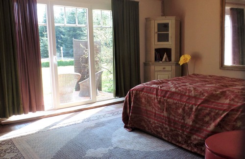 Varel Other | Spacious vacation apartment with fireplace and barrel sauna in the sheltered garden.