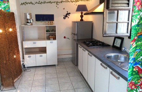 Ducos Apartment | Spacious villa downstairs in mature garden with swimming pool surrounded by greenery