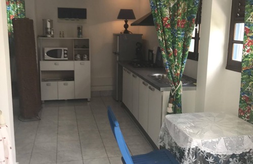 Ducos Apartment | Spacious villa downstairs in mature garden with swimming pool surrounded by greenery