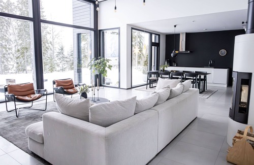 Sotkamo Villa | Spacious Villa with panoramic lake views and beachfront sauna by the beach.