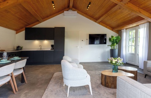 Municipality of Ede House | Spacious wellness home for 6 guests with a private sauna and hot tub in the garden. Stylish, single-floor layout and designed for pure relaxation.
