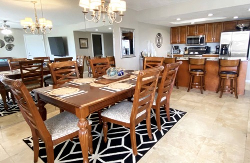 Indian Shores Condo | Spacious white sandy beach side condo with intercoastal water view