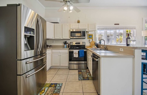 Uptown - Upper Duval House | Spanish Lime Cottage by AvantStay | Old Town Key West Location | Long Stays Only