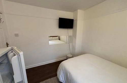 Patchway House | Spare room in a family house
