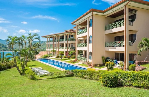 Playa Flamingo Condo | Spectacular Ocean Views with Pool