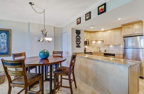 Vanderbilt Beach Condo | Spectacular unobstructed GULF, BAY and SUNSET view, 5 minutes walk to the beach.