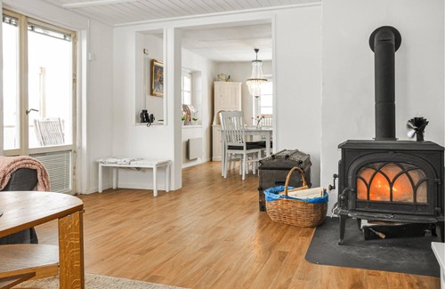 Saffle House | Spend a relaxing vacation in this vacation home with a beautiful view of the countryside.
