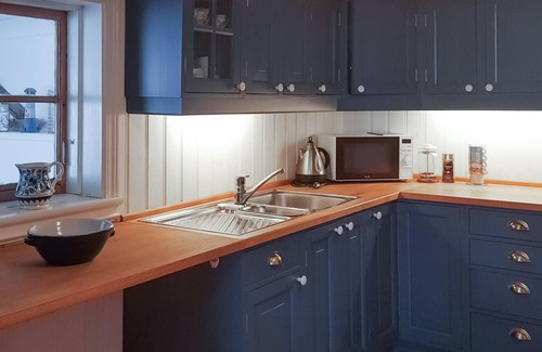 Kolbjørnsvik House | Spend an undisturbed vacation in this vacation home with a view of the fjord.