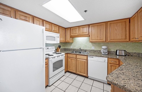 Orange Beach Condo | Splash Pad for the Kiddos | Beachfront Condo with Private Balcony | Beach Getaways