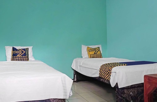 Tjihadak Hotel | SPOT ON 91860 Amazon Homestay Syariah 2