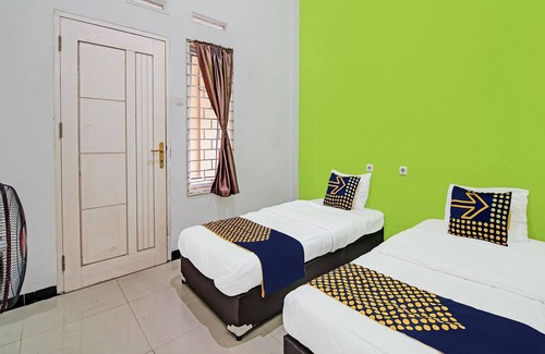 Pekanbaru Hotel | SPOT ON 92255 Lucky Guesthouse