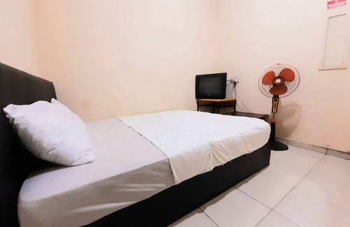 Pekanbaru Hotel | SPOT ON 93326 Pondok Anie SyariahNearJembatan Siak