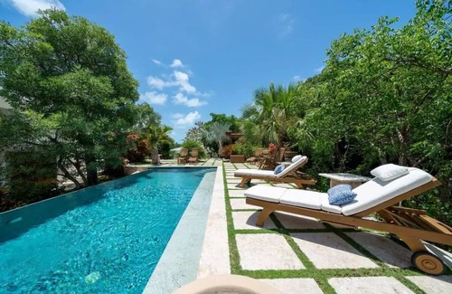 Current House | Sprawling Caribbean Beachfront Estate - Multiple Suites- Private Manicured Beach