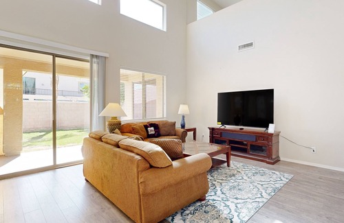 Carefree Crossing House | Sprawling home with an enclosed yard, open layout, fireplace, grill, & W/D