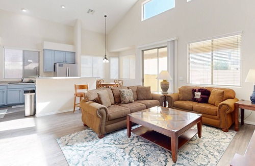 Carefree Crossing House | Sprawling home with an enclosed yard, open layout, fireplace, grill, & W/D