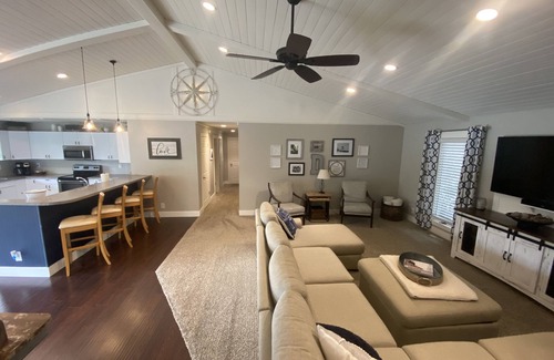 Ferrysburg House | Spring Lake waterfront home on Markers Cove with full Spring Lake access!