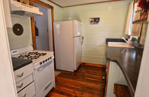 Tuscarora Cottage | Springs Store Cottage Entire Property king bed