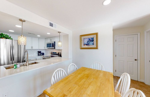 Sneads Ferry Condo | St. Regis beach condo with ocean-view balcony, pool, gym & restaurant