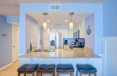 Sneads Ferry Condo | St. Regis beach condo with oceanfront views, pool, gym & restaurant