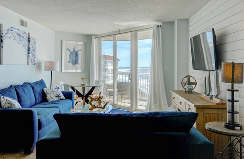 Sneads Ferry Condo | St. Regis condo with relaxing oceanfront views, pool, gym & restaurant