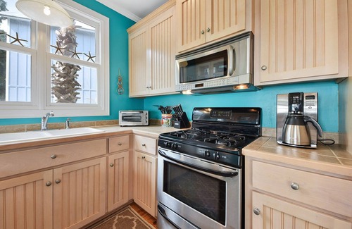 Saint Simons Island House | St Simons Coolest Dog Friendly Beach Bungalow with Private Heated Pool/Hot Tub!