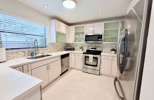 Coral Way House | Stay Central: Relax in Our Heated Pool Oasis