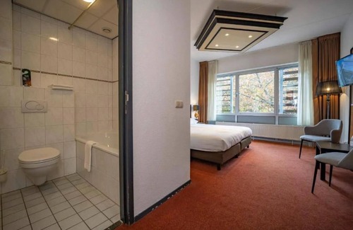 Apeldoorn Hotel | Stay Close to Theater Orpheus with Free Parking and Access to Nature Trails