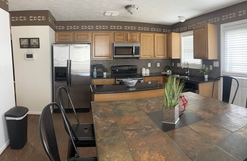Terry Sanford House | Stay in a cozy downtown cottage within 5 mi of I-95, Hwy 301 & NC Hwy 87!