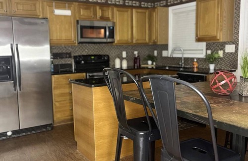 Terry Sanford House | Stay in a cozy downtown cottage within 5 mi of I-95, Hwy 301 & NC Hwy 87!