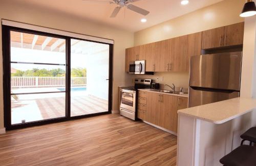 Leeward Settlement Apartment | Stay in a Long Bay Beach Villa with a Shared Pool