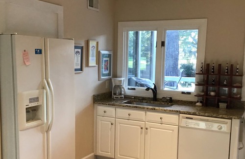 Sea Pines House | Stay in the heart of Harbor Town on a lagoon between the 16th Green and 17 tee